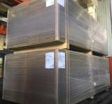 Bild zu UK - Umreifung mit Seitenleisten + Wickler mit Kantenschutz - OSB Plattenstapel